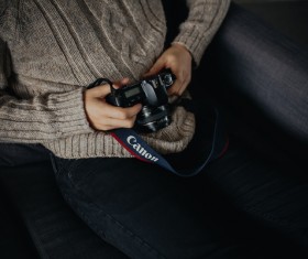woman holding modern camera Stock Photo