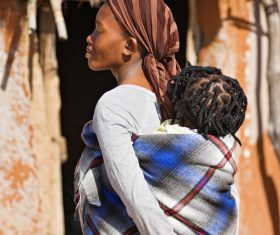 African mother On the back baby Stock Photo 02