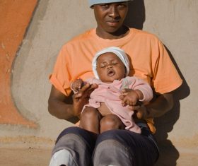 African mother holding baby Stock Photo 01