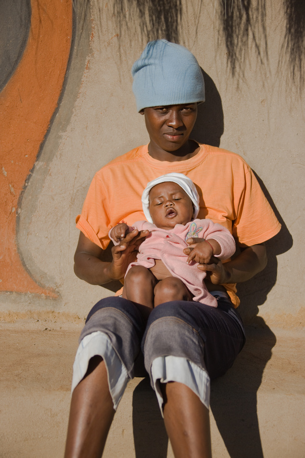 African mother holding baby Stock Photo 01