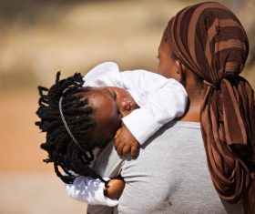 African mother holding baby Stock Photo 02