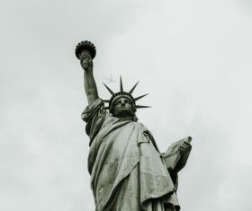 Artistic liberty statue under sky Stock Photo