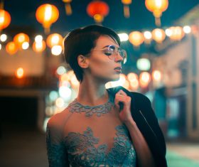 Attractive elegant young woman in festival Stock Photo