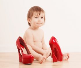Baby playing with high heels Stock Photo 02