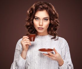 Beautiful smiling woman with a cup of tea Stock Photo 01