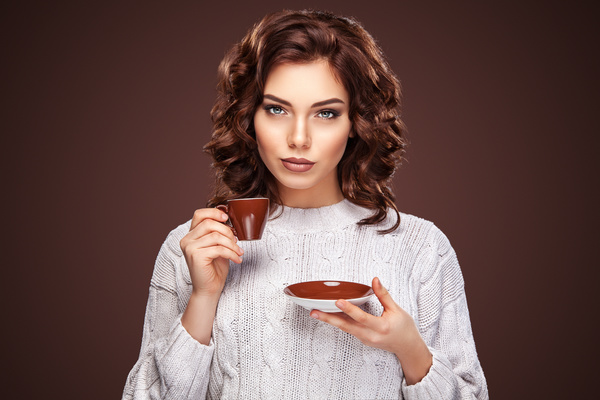 Beautiful smiling woman with a cup of tea Stock Photo 01