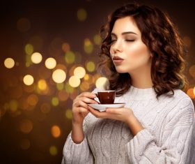 Beautiful smiling woman with a cup of tea Stock Photo 04