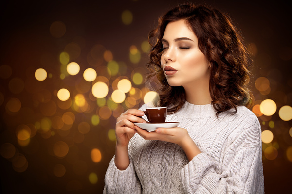 Beautiful smiling woman with a cup of tea Stock Photo 04