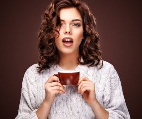 Beautiful smiling woman with a cup of tea Stock Photo 05