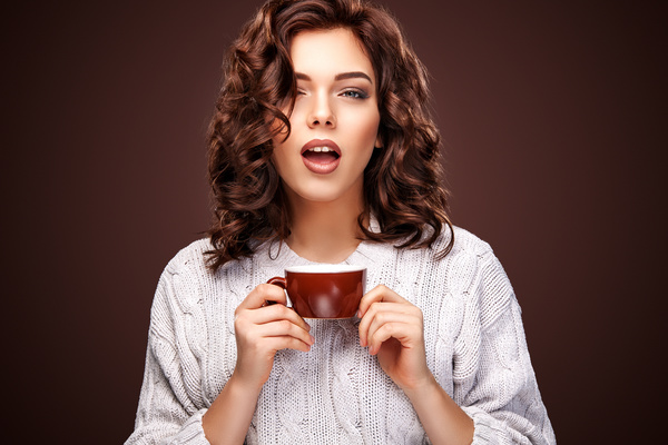 Beautiful smiling woman with a cup of tea Stock Photo 05