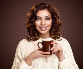 Beautiful smiling woman with a cup of tea Stock Photo 06