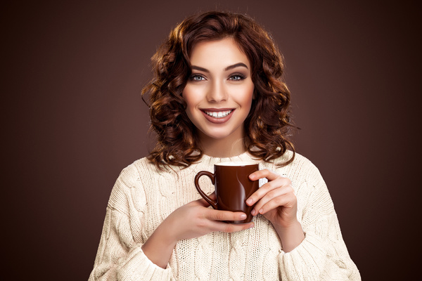 Beautiful smiling woman with a cup of tea Stock Photo 06