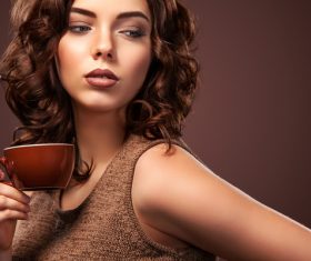 Beautiful smiling woman with a cup of tea Stock Photo 07