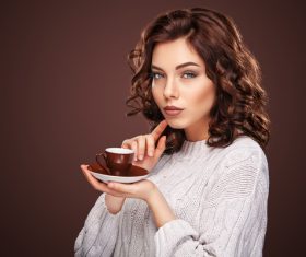 Beautiful smiling woman with a cup of tea Stock Photo 08