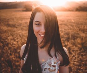 Beautiful young girl on the field Stock Photo