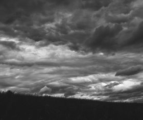Black white picture of cloudy sky at dusk Stock Photo