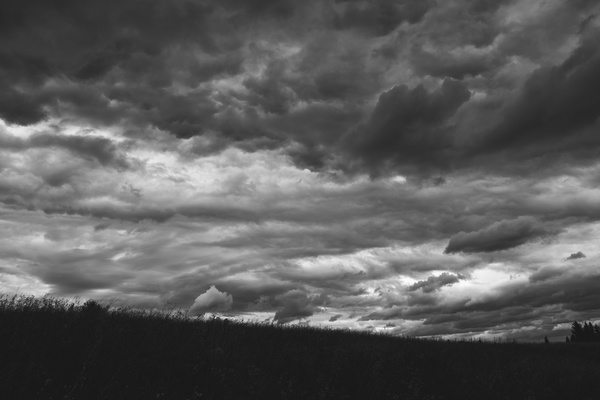 Black white picture of cloudy sky at dusk Stock Photo