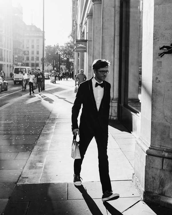 Black white picture of elegant man on street Stock Photo