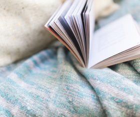 Book on a blanket Stock Photo