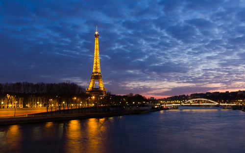 Bright Eiffel Tower at night Stock Photo 01
