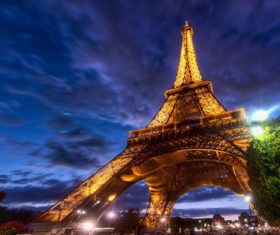 Bright Eiffel Tower at night Stock Photo 02