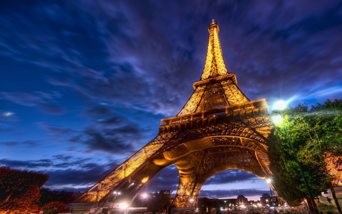 Bright Eiffel Tower at night Stock Photo 02