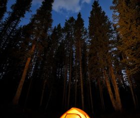 Bright camping tent at night Stock Photo