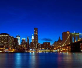 Brightly lit city and bridge Stock Photo 01