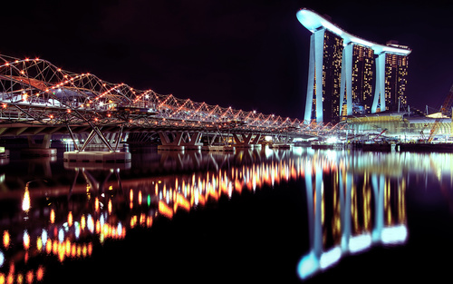 Brightly lit city and bridge Stock Photo 03