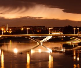 Brightly lit city and bridge Stock Photo 06