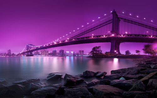 Brightly lit city and bridge Stock Photo 07