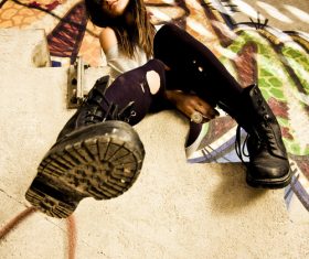Casual style girl sitting on the steps Stock Photo