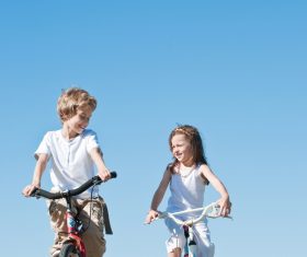 Children riding bicycles Stock Photo 01
