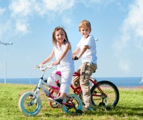 Children riding bicycles Stock Photo 02