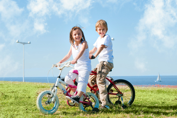 Children riding bicycles Stock Photo 02