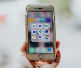 Closeup of hand holding modern smartphone Stock Photo