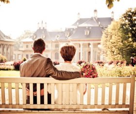 Couple sitting on a bench Stock Photo