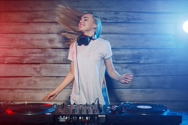 DJ girl swings with music Stock Photo 01