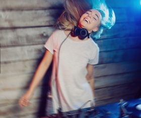 DJ girl swings with music Stock Photo 02