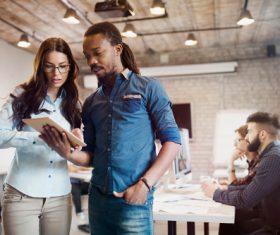 Designers exchanging opinions Stock Photo