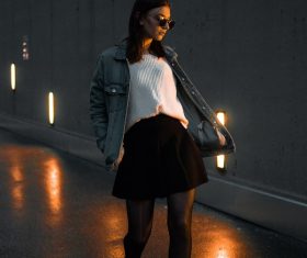 Dusk street wearing short skirt black stockings girl Stock Photo