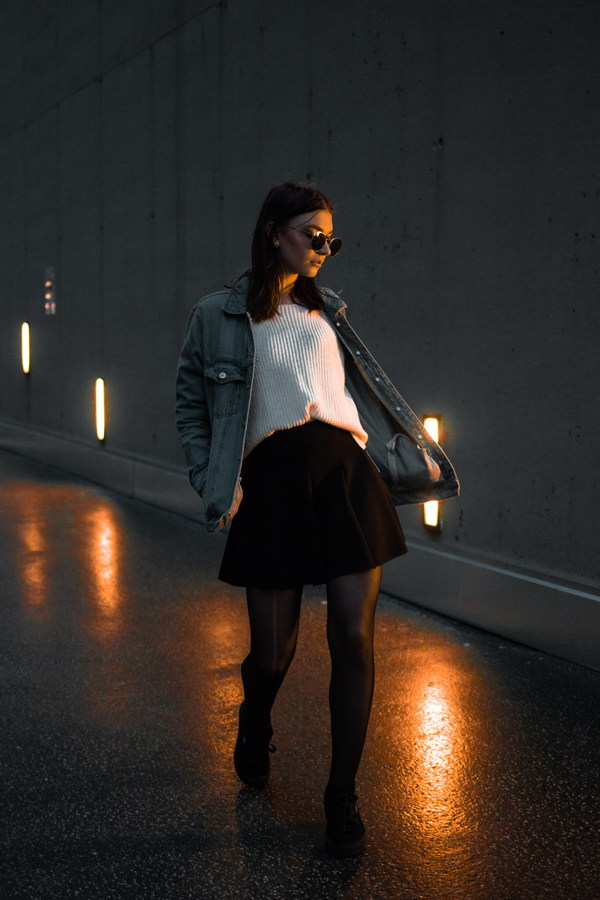 Dusk street wearing short skirt black stockings girl Stock Photo