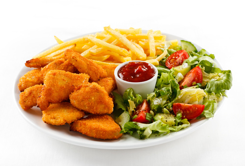 Fried potato cake and French fries salad and ketchup Stock Photo