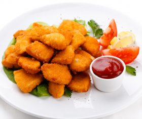 Fried potato cake with tomato sauce Stock Photo