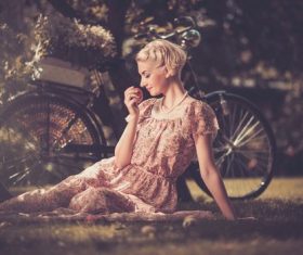 Girl with a bicycle resting in the bosom of nature Stock Photo (6)