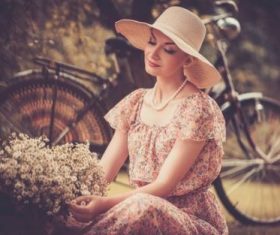 Girl with a bicycle resting in the bosom of nature Stock Photo (8)