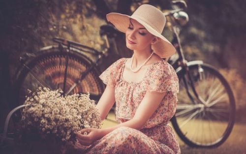 Girl with a bicycle resting in the bosom of nature Stock Photo (8)