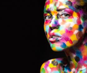 Girl with colored face painted Stock Photo 01