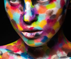 Girl with colored face painted Stock Photo 02