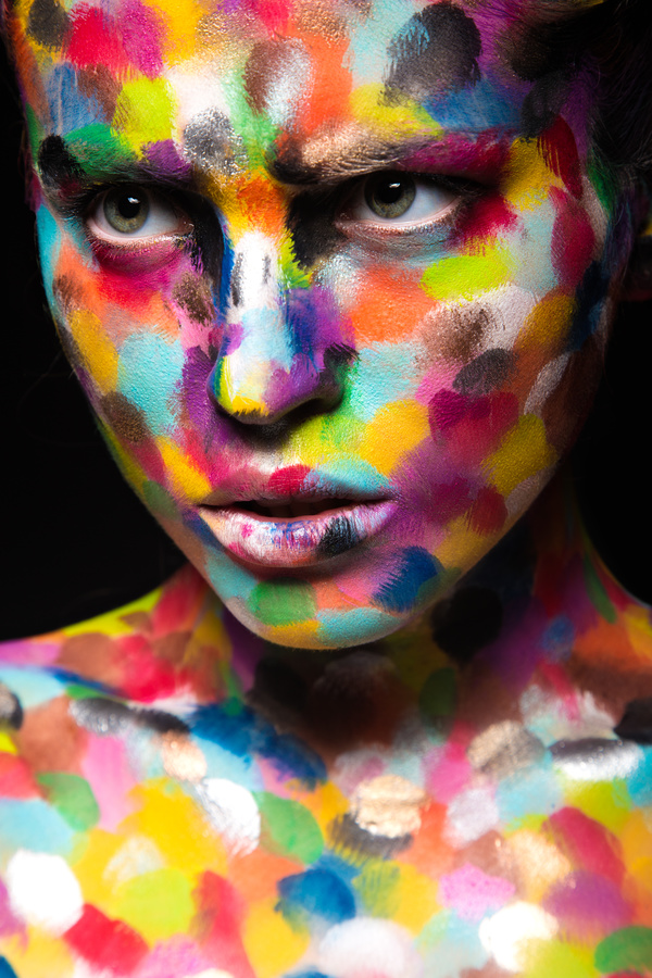 Girl with colored face painted Stock Photo 02